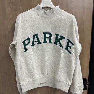 Parke Mock Neck Cream Pullover Sweatshirt with Green Appliqué